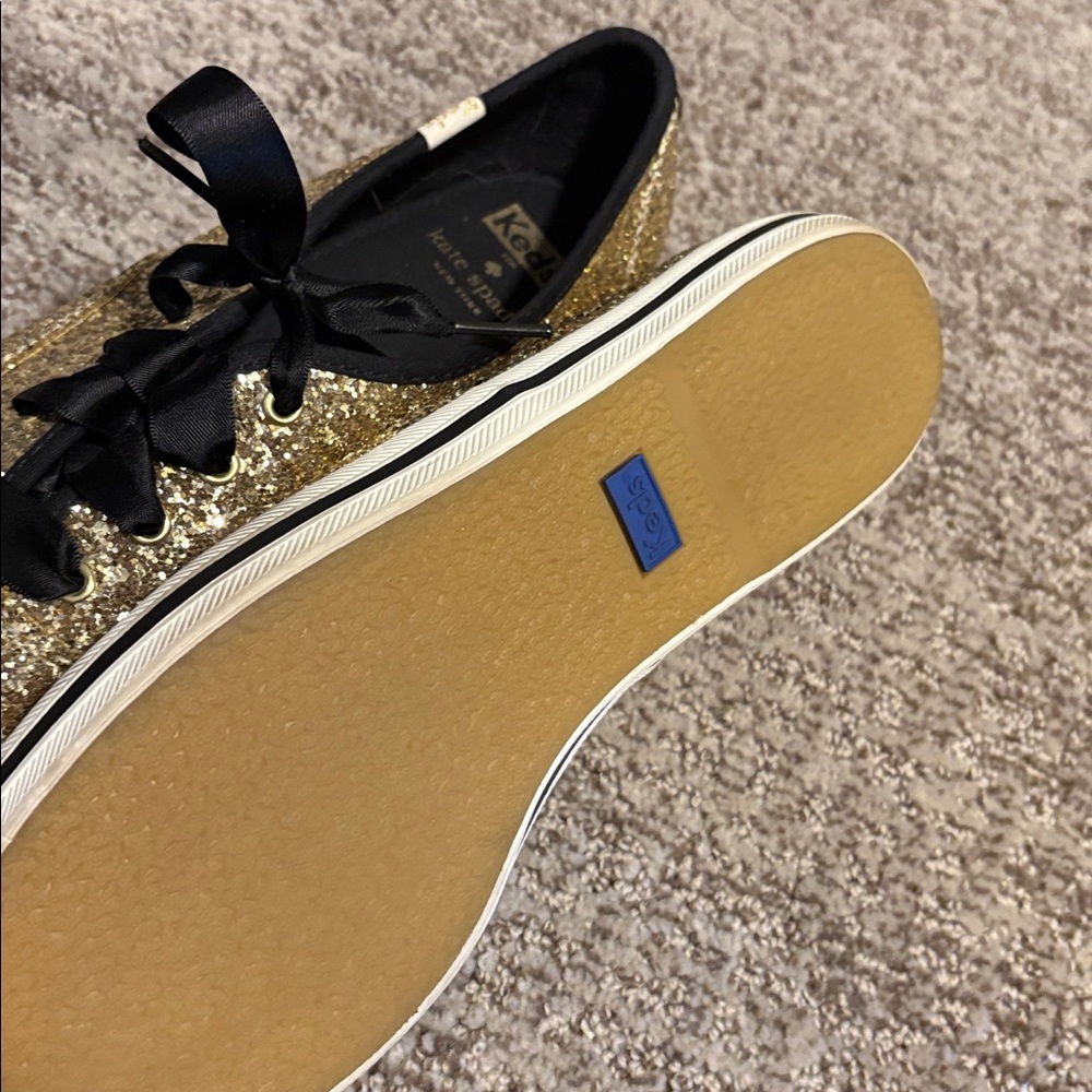 Kate Spade Women's Gold Glitter Sneakers with Black Accents - Picture 3 of 3